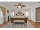 Spacious main bedroom with hardwood floors and a king-size bed at 18491 Hottelet Cir, Port Charlotte, FL 33948