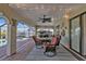 Covered patio with seating area, string lights, and pool view at 18491 Hottelet Cir, Port Charlotte, FL 33948