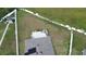 Aerial view of a home showcasing a patio and spacious backyard at 2201 Grand Flora Trl, Bradenton, FL 34208