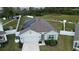 Aerial view of a house with solar panels and a fenced backyard at 2201 Grand Flora Trl, Bradenton, FL 34208