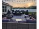 Spacious backyard patio with comfortable seating and grilling area at 2201 Grand Flora Trl, Bradenton, FL 34208