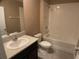 Clean bathroom featuring a shower/tub combo and vanity at 2201 Grand Flora Trl, Bradenton, FL 34208