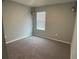 Charming bedroom with a window and light-green walls at 2201 Grand Flora Trl, Bradenton, FL 34208