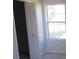 Bedroom features a closet and window for natural light at 2410 Lanier Rd, Punta Gorda, FL 33982