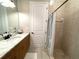 Bathroom with granite vanity and shower/tub at 283 White Marsh Ln, Rotonda West, FL 33947