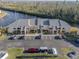 Aerial view of condo building with parking and waterfront access at 3256 White Ibis Ct # 22A, Punta Gorda, FL 33950