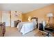 Small bedroom with a full-size bed and built-in dresser at 3256 White Ibis Ct # 22A, Punta Gorda, FL 33950