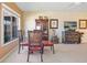 Dining area with a glass-top table and four chairs at 3256 White Ibis Ct # 22A, Punta Gorda, FL 33950