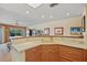 Kitchen with granite countertops and light wood cabinets at 3256 White Ibis Ct # 22A, Punta Gorda, FL 33950
