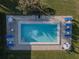 Inviting pool area with lounge chairs and patio tables for relaxation at 3256 White Ibis Ct # 22A, Punta Gorda, FL 33950