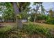 Backyard with shed and mature trees at 4485 Herder St, Port Charlotte, FL 33948