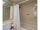 Clean bathroom with shower/tub combo and white curtain at 4485 Herder St, Port Charlotte, FL 33948