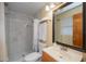 Bathroom boasts a shower with marble tile and a vanity at 4485 Herder St, Port Charlotte, FL 33948
