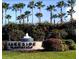 Lakeside Plantation entrance, featuring a water fountain and lush landscaping at 1796 Scarlett Ave, North Port, FL 34289