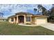 Beautiful one-story house featuring a double door entry and spacious driveway at 3100 Sheboygan Ave, North Port, FL 34286