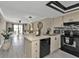 Modern kitchen with breakfast bar and open layout at 25225 Rampart Blvd # 1901, Punta Gorda, FL 33983