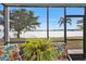 Relaxing screened lanai overlooking a tranquil lake at 25225 Rampart Blvd # 1901, Punta Gorda, FL 33983