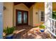 Front entrance with double doors and brick walkway at 4431 Gardner Dr, Port Charlotte, FL 33952
