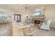 Living room with fireplace and access to dining area at 4431 Gardner Dr, Port Charlotte, FL 33952