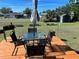 Relaxing backyard with patio furniture and shed at 161 Coblentz St, Port Charlotte, FL 33954