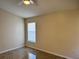 Bright bedroom with tiled floors and window coverings at 161 Coblentz St, Port Charlotte, FL 33954