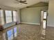 Bright living room with vaulted ceilings and tile floors at 161 Coblentz St, Port Charlotte, FL 33954