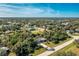 Single story home with a large lot and tropical landscaping close to the coast at 18565 Edgewater Dr, Port Charlotte, FL 33948