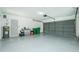 Two-car garage with plenty of room for storage and workshop at 18565 Edgewater Dr, Port Charlotte, FL 33948