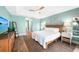 Serene main bedroom featuring a king-size bed, dresser, and calming decor at 221 Sportsman Rd, Rotonda West, FL 33947