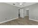 Mirrored closet and ceiling fan in bedroom at 3324 Avanti Cir, North Port, FL 34287