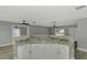 Kitchen with large island and granite countertops at 3324 Avanti Cir, North Port, FL 34287