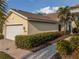 Single-story house with attached garage and landscaped walkway at 3820 Tripoli Blvd # 42, Punta Gorda, FL 33950