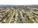 Aerial view of waterfront homes and canal at 3999 Conway Blvd, Port Charlotte, FL 33952