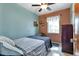 Cozy bedroom with a double bed and ceiling fan at 3999 Conway Blvd, Port Charlotte, FL 33952