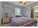 Comfortable bedroom with a queen bed and ensuite access at 3999 Conway Blvd, Port Charlotte, FL 33952