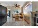 Small dining area with wooden table and chairs, near kitchen at 3999 Conway Blvd, Port Charlotte, FL 33952