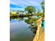 Canal view from a wooden dock at 3999 Conway Blvd, Port Charlotte, FL 33952