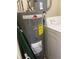 Laundry room features Rheem water heater and Amana washer and dryer at 3999 Conway Blvd, Port Charlotte, FL 33952