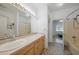 Bathroom with double vanity and a bathtub at 4132 Michel Tree St, Port Charlotte, FL 33948