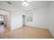 Light and airy bedroom with wood-look flooring at 4132 Michel Tree St, Port Charlotte, FL 33948