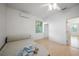 Simple bedroom with light flooring and ceiling fan at 4132 Michel Tree St, Port Charlotte, FL 33948