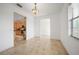 Dining area with kitchen access and tile floor at 4132 Michel Tree St, Port Charlotte, FL 33948