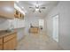 Kitchen with laundry area and access to other rooms at 4132 Michel Tree St, Port Charlotte, FL 33948