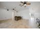 Living area with tiled floors and ceiling fans at 4132 Michel Tree St, Port Charlotte, FL 33948