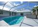 Large pool and spa with screened enclosure at 4132 Michel Tree St, Port Charlotte, FL 33948