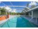 Spacious pool area with screened enclosure at 4132 Michel Tree St, Port Charlotte, FL 33948