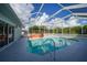 Relaxing pool area with covered patio and hot tub at 4132 Michel Tree St, Port Charlotte, FL 33948