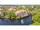 Aerial shot featuring lush trees, water view and residences at 4178 Central Sarasota Pkwy # 326, Sarasota, FL 34238