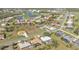 Bird's-eye view of the house and surrounding golf course community at 4315 Cape Haze Dr, Placida, FL 33946