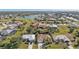 Aerial view of a luxury home community with golf course and water views at 4315 Cape Haze Dr, Placida, FL 33946